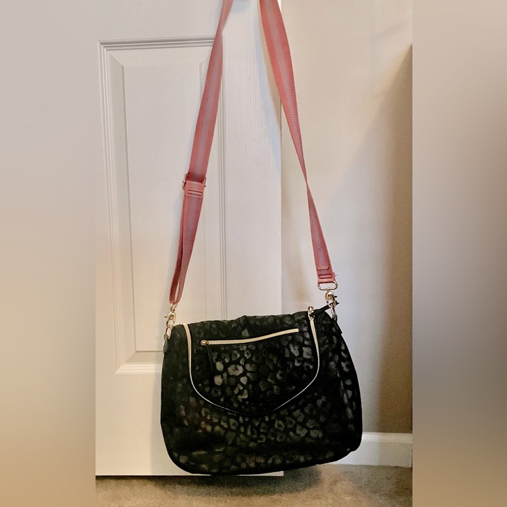 Stella & Dot black leopard cross body or shoulder purse with pink striped strap